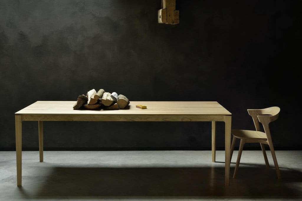 Ethnicraft Bok dining table in natural oak with minimalist design and solid construction, accompanied by matching chair