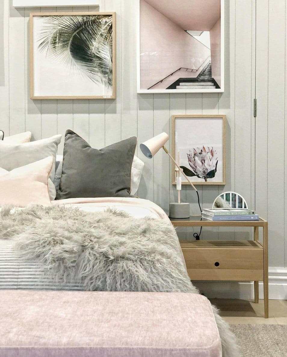 Ethnicraft Spindle Bedside table in natural oak with single drawer and smokey glass top in modern bedroom setting