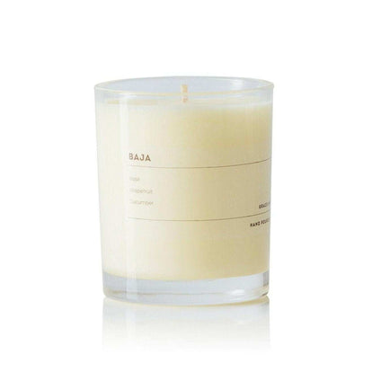 Grace and James Baja scented soy wax candle with basil, grapefruit, and cucumber fragrance in clear glass jar