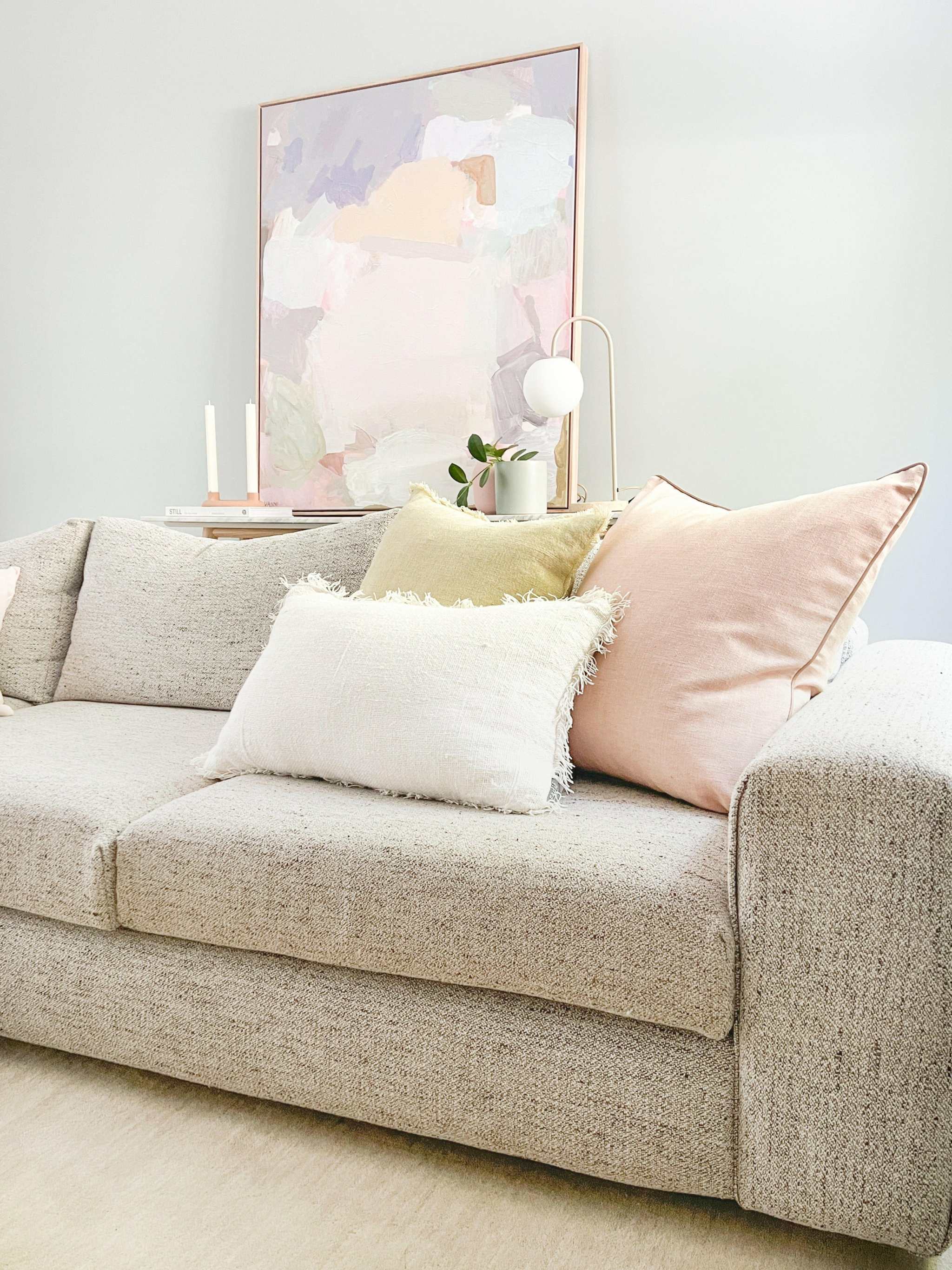 norsuHOME sofa Australian made comfortable durable beige fabric sofa with pastel cushions and modern living room decor