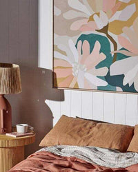 Kimmy Hogan Limited Edition Flowerbed III fine art canvas print with vibrant floral design in a cozy bedroom setting