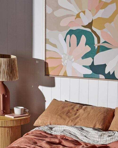 Kimmy Hogan Limited Edition Flowerbed III fine art canvas print with vibrant floral design in a cozy bedroom setting