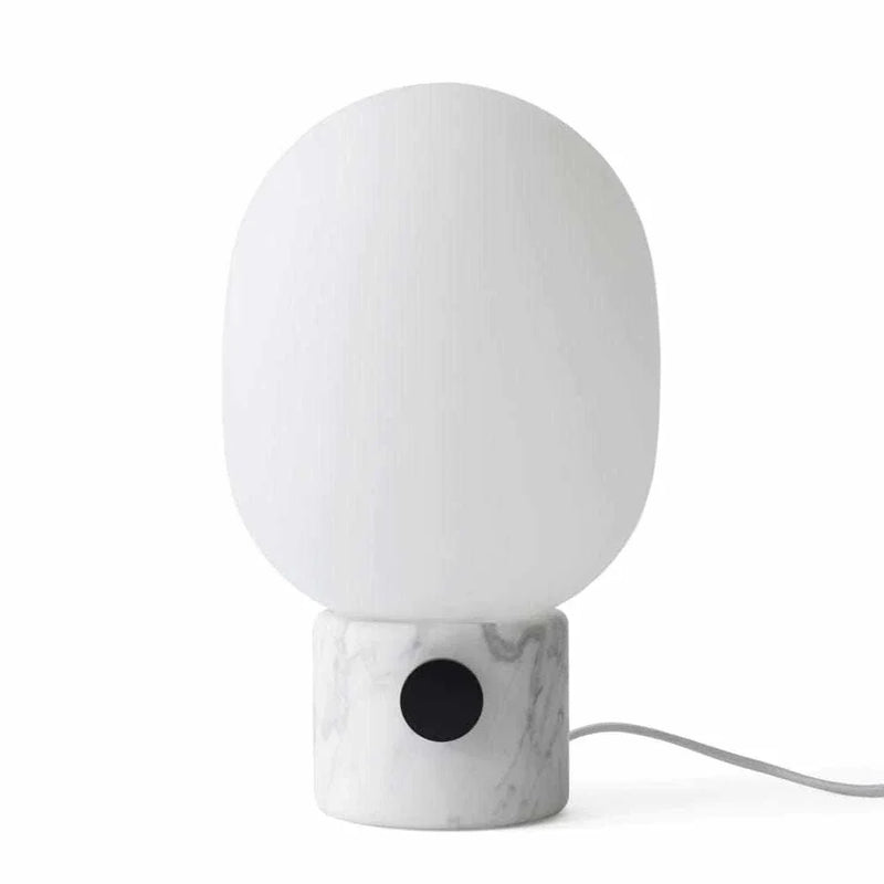 Menu JWDA Marble Lamp with Carrara marble base, white glass shade, and black metal knob switch