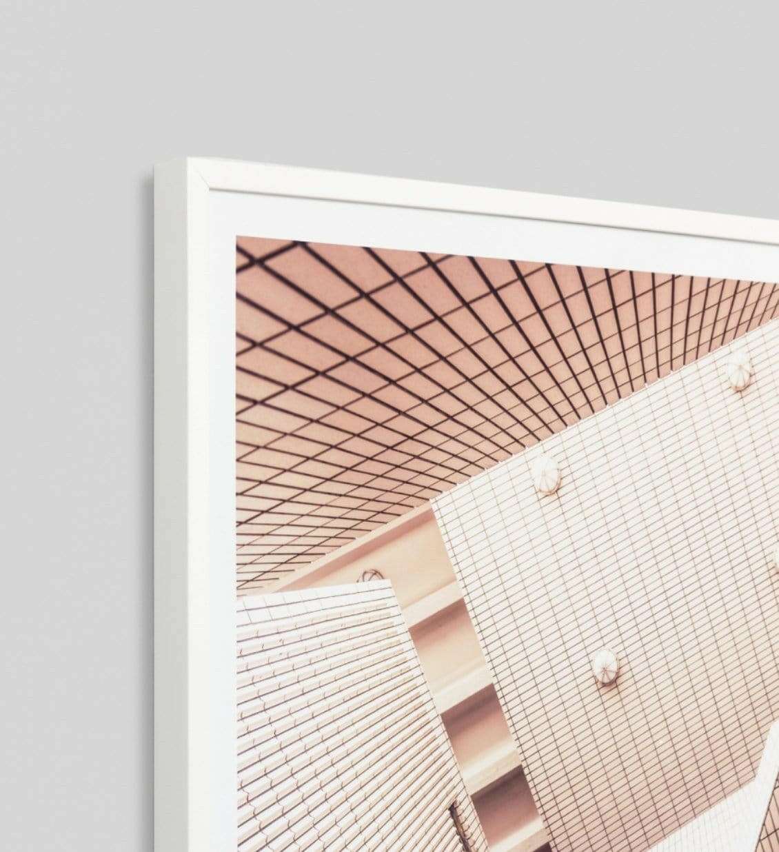 Middle Of Nowhere abstract architecture framed print with minimalist geometric building patterns in a white frame.