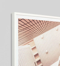 Middle Of Nowhere abstract architecture framed print with minimalist geometric building patterns in a white frame.