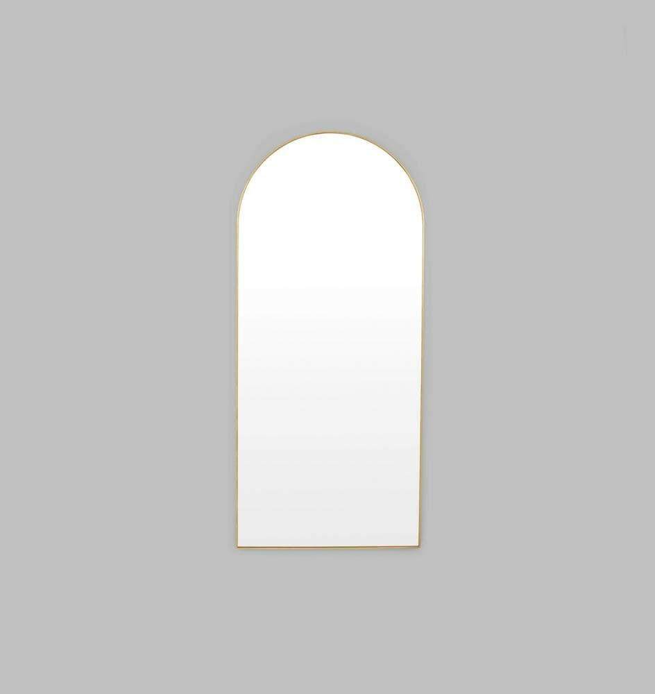 Middle of Nowhere Bjorn brass arch floor mirror with gold leaf frame and minimalist design