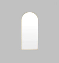 Middle of Nowhere Bjorn brass arch floor mirror with gold leaf frame and minimalist design