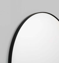 Middle of Nowhere Bjorn Arch Mirror in black with modern, minimalist arch design for versatile home decor