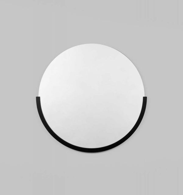 Middle of Nowhere Dawn round black framed minimalist wall mirror.