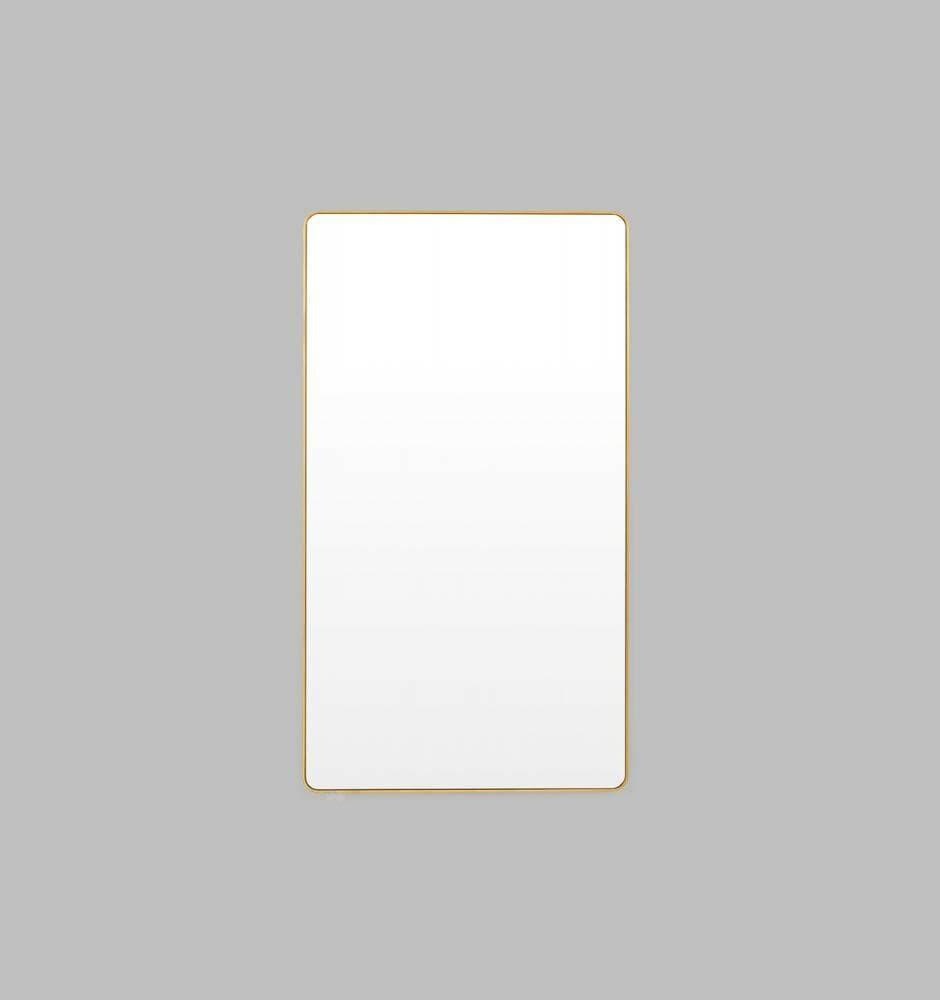 Flynn Curve series brass framed rectangular leaning mirror with rounded corners and antique gold leaf finish