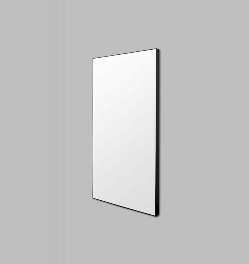 Minimalistic black framed Flynn Leaner Mirror by Middle of Nowhere, modern rectangular design.