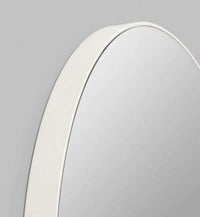 Minimalistic Middle of Nowhere Flynn round mirror with bright white matte wooden frame in various sizes