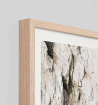Middle of Nowhere Ocean Passage framed photographic print with natural oak frame showing textured ocean rocks