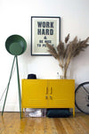 Yellow Mustard Made Locker low console with handles and locks in modern interior setting