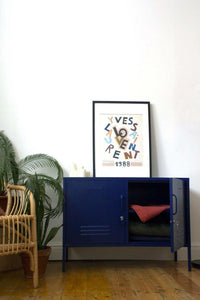 Navy Mustard Made Locker with open door, adjustable shelf, and storage inside in modern living room setting
