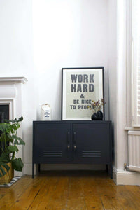 Black Mustard Made Lowdown Slate locker cabinet with handles and locks in a modern room setting