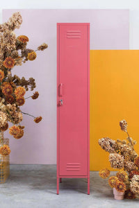 Pink Mustard Made Locker Skinny Berry with lock and vents, standing upright with floral decor background