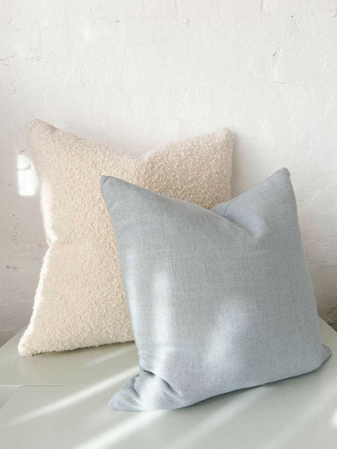 Handmade norsu Studio Cushion in Lexus Duck Egg and cream with Warwick fabric and feather down filling