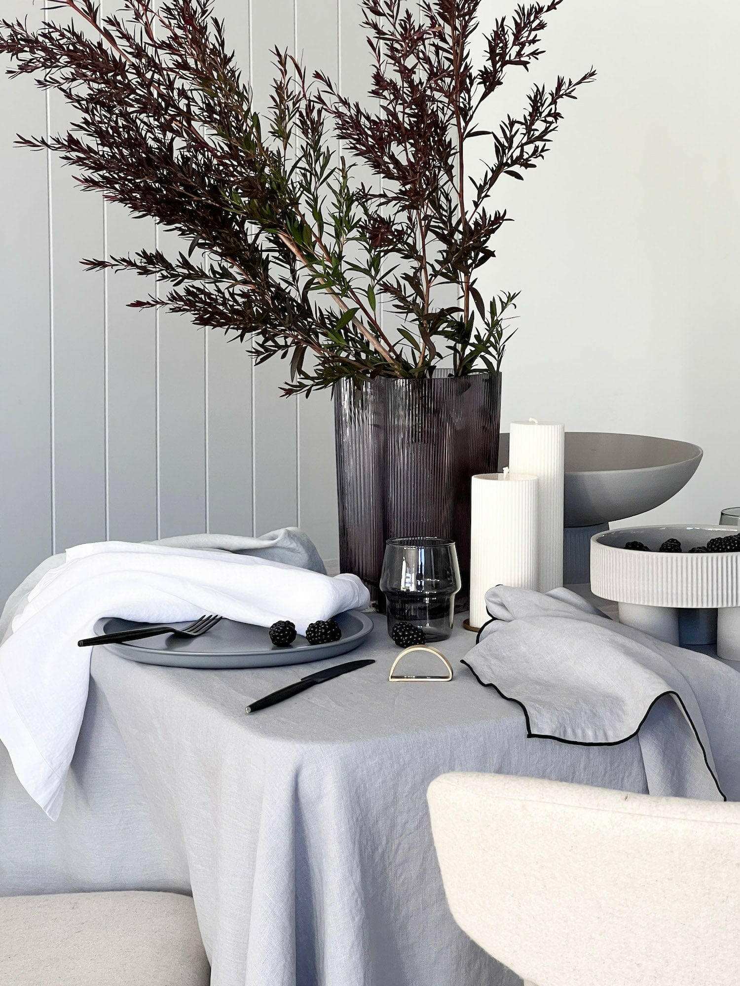 Rendr 100 Linen white 100% linen napkins set of four on a dining table with modern table setting and decor