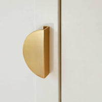 norsu Studio Solid Brass half moon door handle in brushed gold for cabinets and cupboards