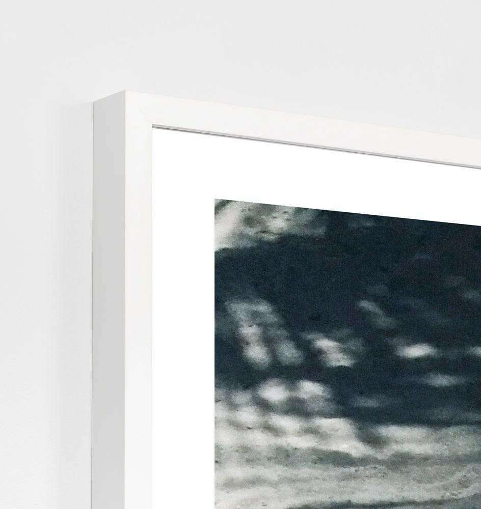 Framed Middle of Nowhere On The Sand photographic print with white frame and glass, modern wall art.