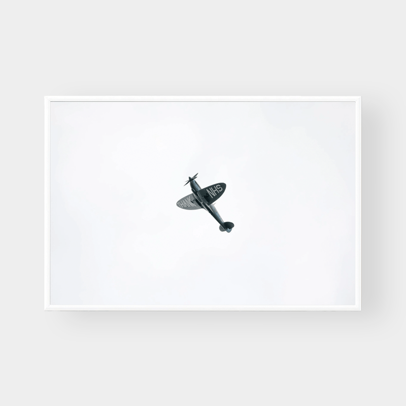 Framed THANK U Print wall art featuring a black airplane on a white background in minimalist style