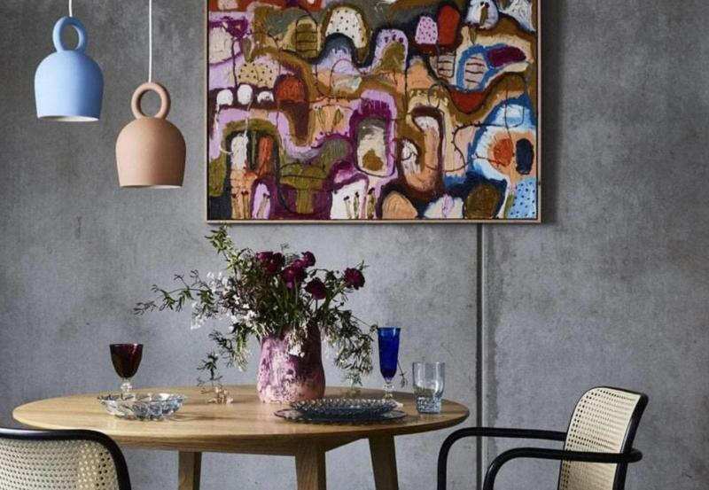 POTT Lighting Calo Pendant salmon handmade pottery bell-shaped pendant light with natural jute rope over wooden dining table