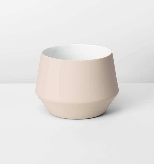 Samso Pot Small nude porcelain planter with matte silicone exterior and glossy interior, fits standard plastic pots, 17cm height.