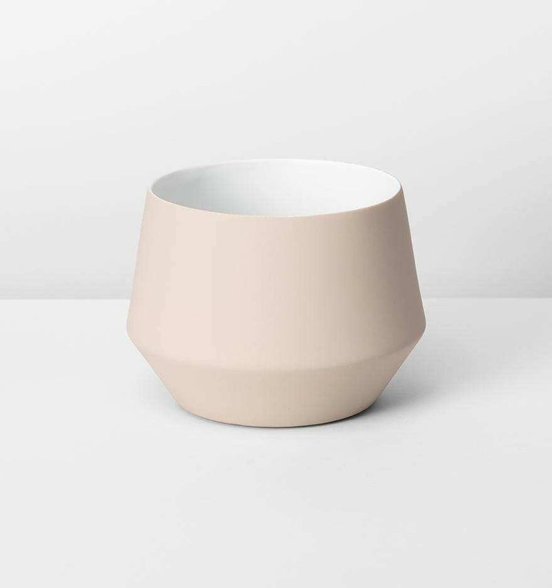 Samso Pot Small nude porcelain planter with matte silicone exterior and glossy interior, fits standard plastic pots, 17cm height.