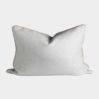 norsu Studio Cushion in Lindeman Snow fabric with blush piping, rectangular soft decorative pillow