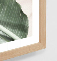 Framed Middle of Nowhere Sunbleached Palms tropical photographic print with oak frame and glass.
