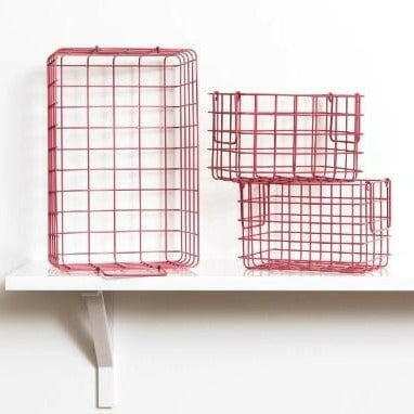 Set of berry-colored wire baskets including one large and two small, designed for locker storage and organization.