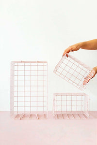 Set of three blush wire baskets in big and small sizes for locker storage and organization