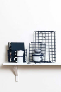 Set of navy wire baskets designed for organizing bits and bobs with different sizes fitting locker shelves.