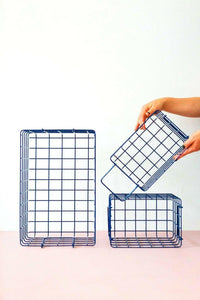 Set of navy wire baskets for all bits and bobs, including one large and two small sizes for versatile locker storage.