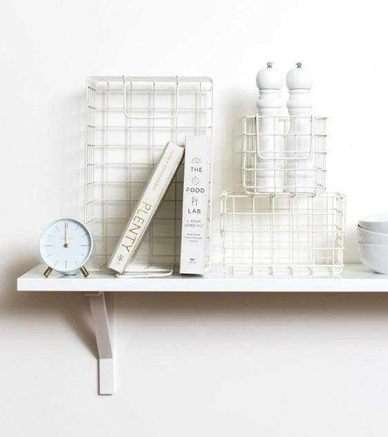 Set of chalk baskets in creamy white, designed for efficient storage inside lockers or shelves, including one large and two small baskets.