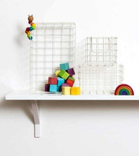 Set of chalk baskets in creamy white designed for locker storage with one large and two small sizes