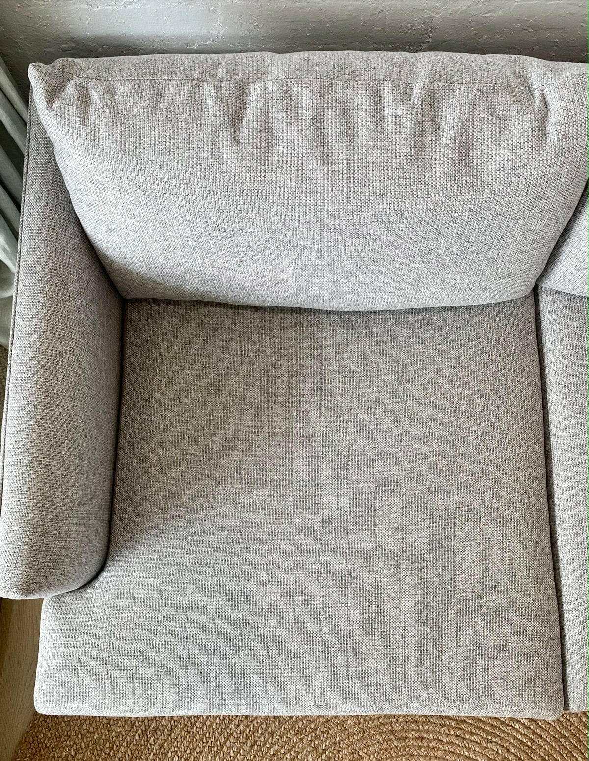 Top view of custom Norsu 2.5 seater sofa in Wells Driftwood fabric with cushioned armrest and backrest