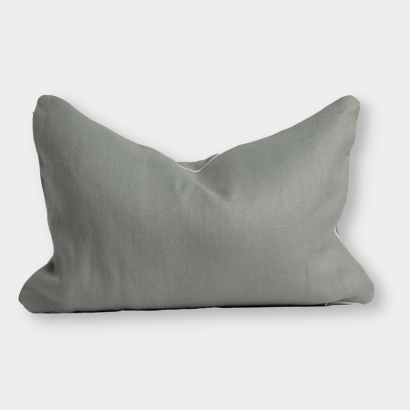 norsu Studio Cushion in Haven Celadon with white leather piping, handmade in Melbourne with Warwick fabrics and feather down filling.