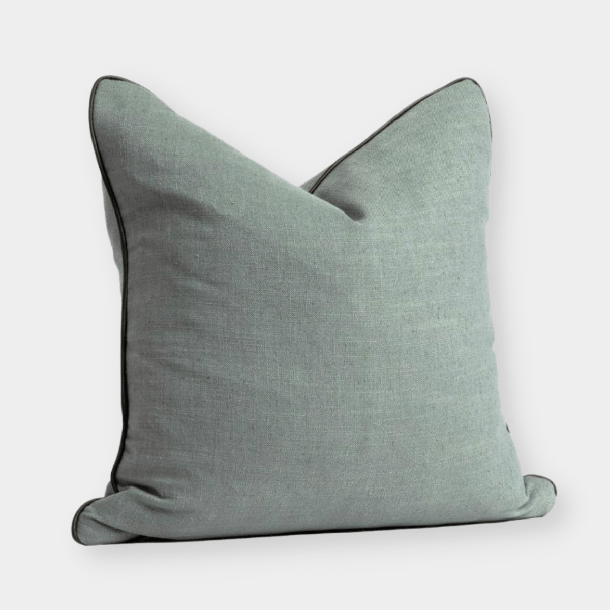 norsu cushion in seaglass fabric with olive leather piping, handmade decorative pillow