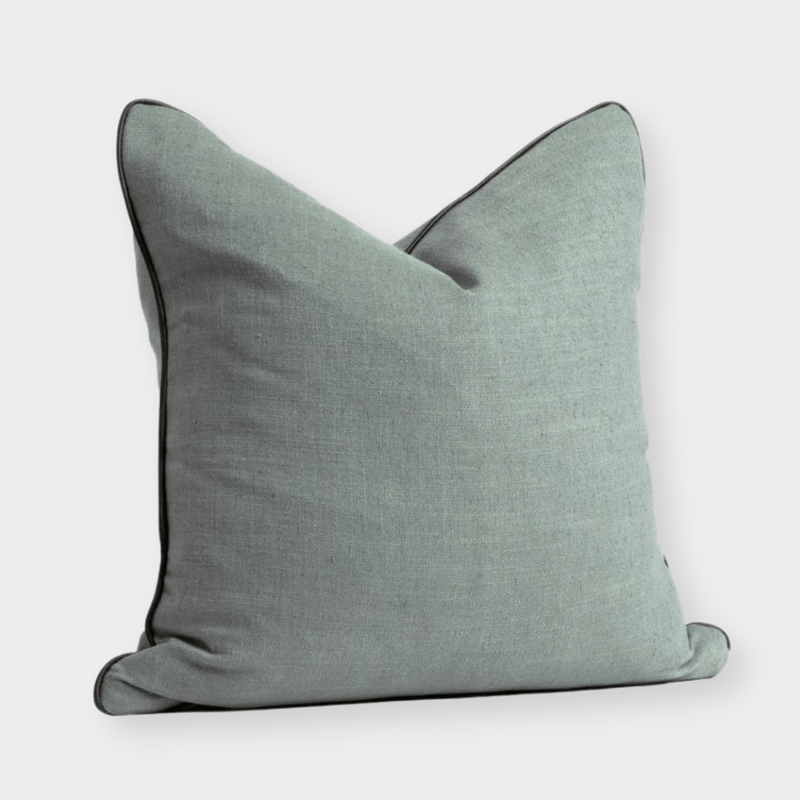 norsu cushion in seaglass fabric with olive leather piping, handmade decorative pillow