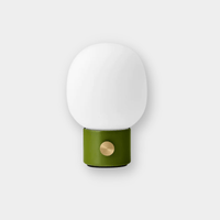 Menu JWDA Portable Lamp in dusty green with brass dimmer, cordless design, and elliptical glass shade.