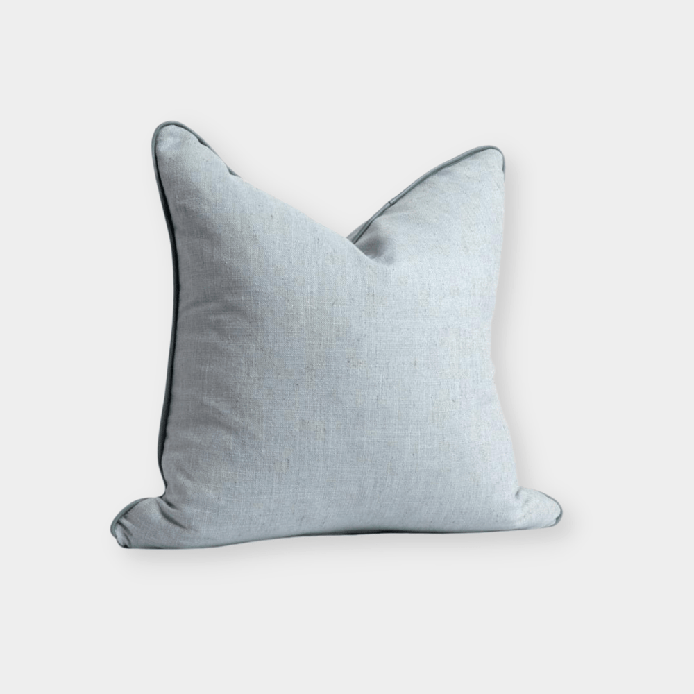 norsu Studio Cushion in Lexus Duck Egg fabric with blue leather piping, handmade feather down filled cushion