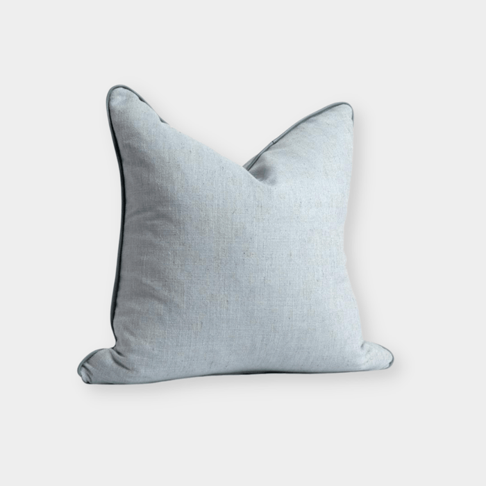 norsu Studio Cushion in Lexus Duck Egg fabric with blue leather piping, handmade feather down filled cushion