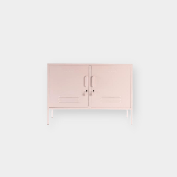 Blush pink Mustard Made Locker with double doors, handles, locks, and ventilation vents on slender legs.