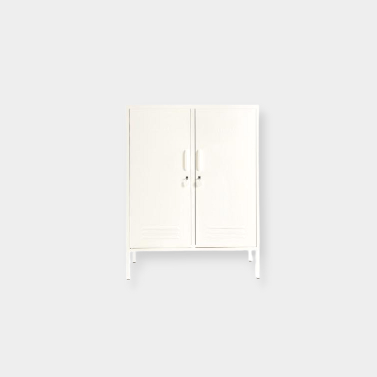 Mustard Made Locker The Midi in soft chalk color with double doors, handles, locks, and adjustable shelves for versatile storage.