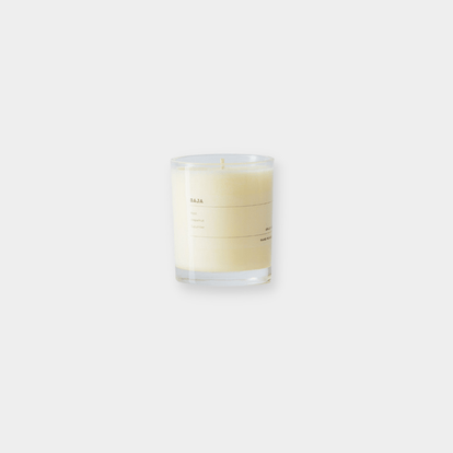 Grace and James Baja scented candle with basil grapefruit cucumber scent in a clear glass jar with single wick and 40-hour burn time