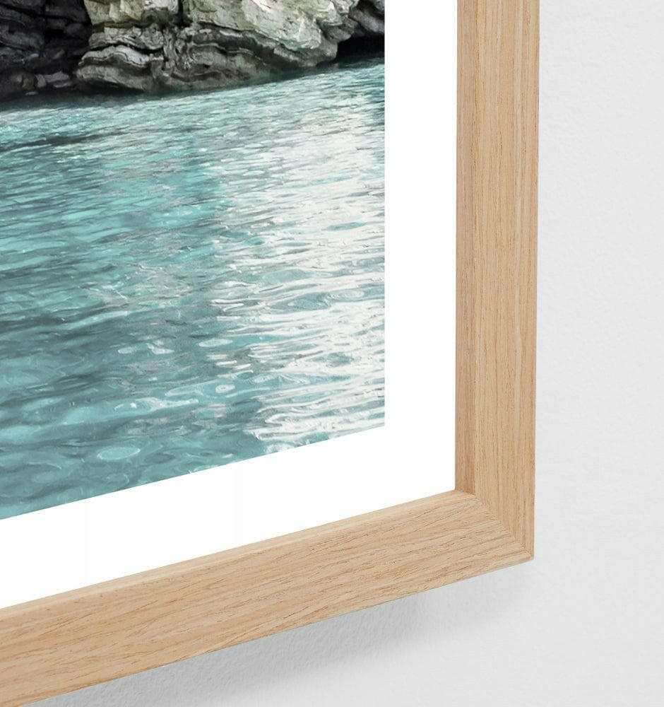 Middle of Nowhere coastal white cliff photographic print framed in oak
